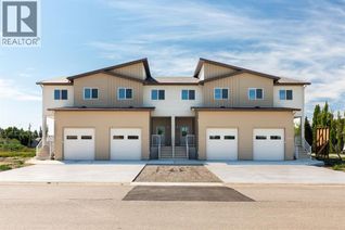 Freehold Townhouse for Sale, 308 S 50 W, Raymond, AB