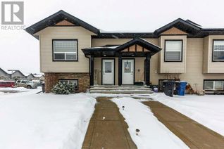 Freehold Townhouse for Sale, 137 Henderson Crescent, Penhold, AB