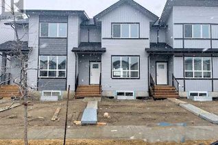 Freehold Townhouse for Sale, 32 Lake Street, Rural Red Deer County, AB