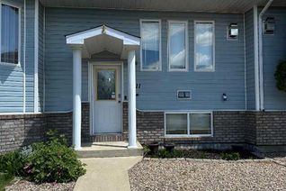 Freehold Townhouse for Sale, 611 2 Street Se, Redcliff, AB