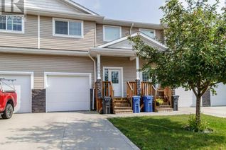 Freehold Townhouse for Sale, 1004 Minto Street, Penhold, AB