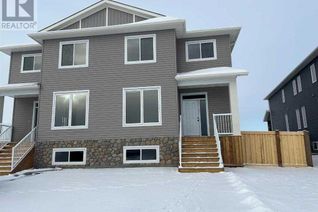 Freehold Townhouse for Sale, B, 10319 149 Avenue, Rural Grande Prairie No. 1, County of, AB