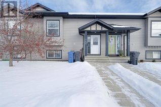 Freehold Townhouse for Sale, 140 Henderson Crescent, Penhold, AB