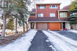 Freehold Townhouse for Sale, 179 Woodvale Bay Sw, Calgary, AB